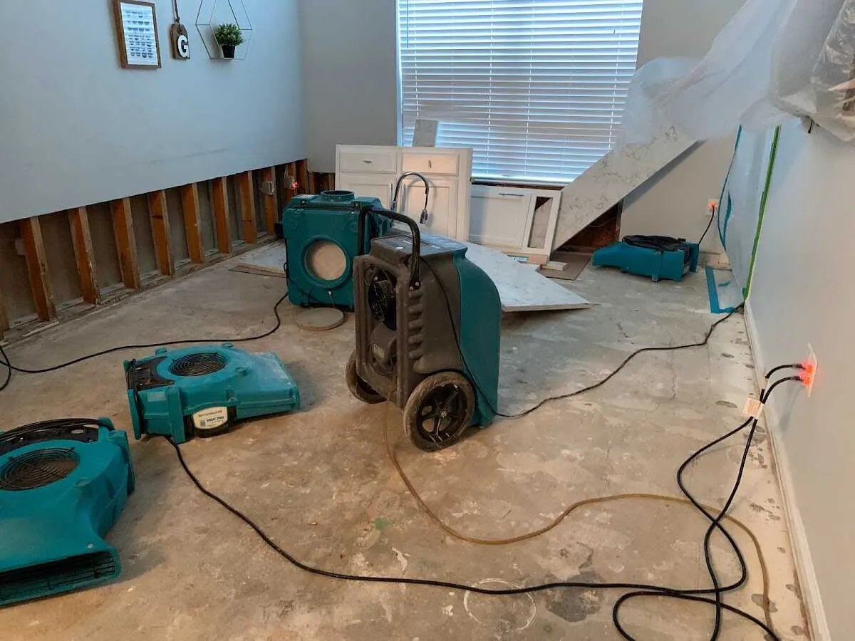 Dehumidifier in flood-cut room for Water Damage Restoration in Stuart